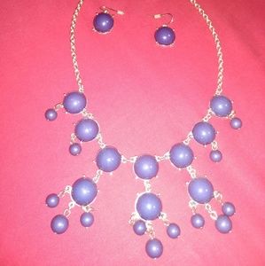 Gold and blue necklace with matching earrings